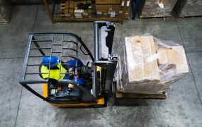 warehouse-man-worker-with-forklift-PR3WQUR.jpg